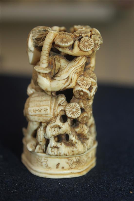 A Japanese walrus ivory okimono, Meiji period, 6.3cm